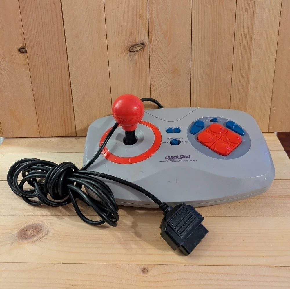 Gray and Red Joystick Controller